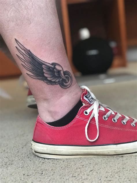 hermes winged shoes tattoo|chest wing tattoos for men.